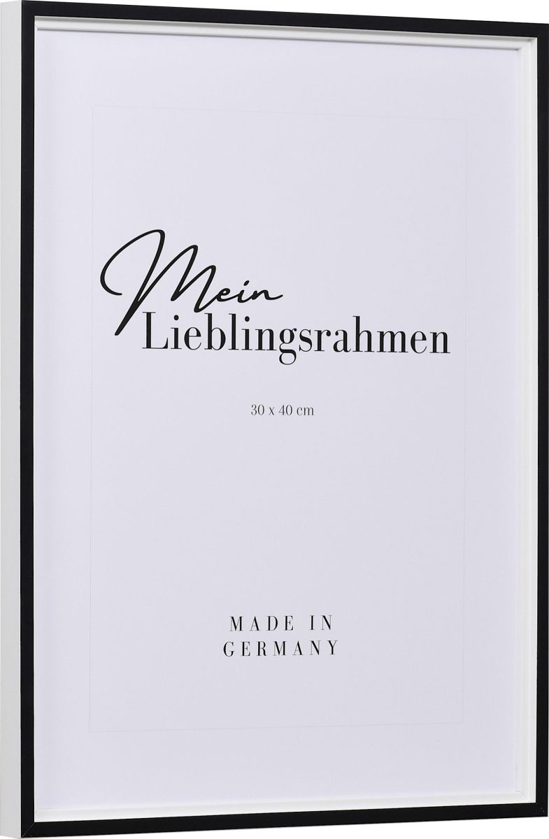 Seitenansicht eines barocken, weiss-schwarzen Holzrahmens mit flacher Hohlkehle und in Retro Optik